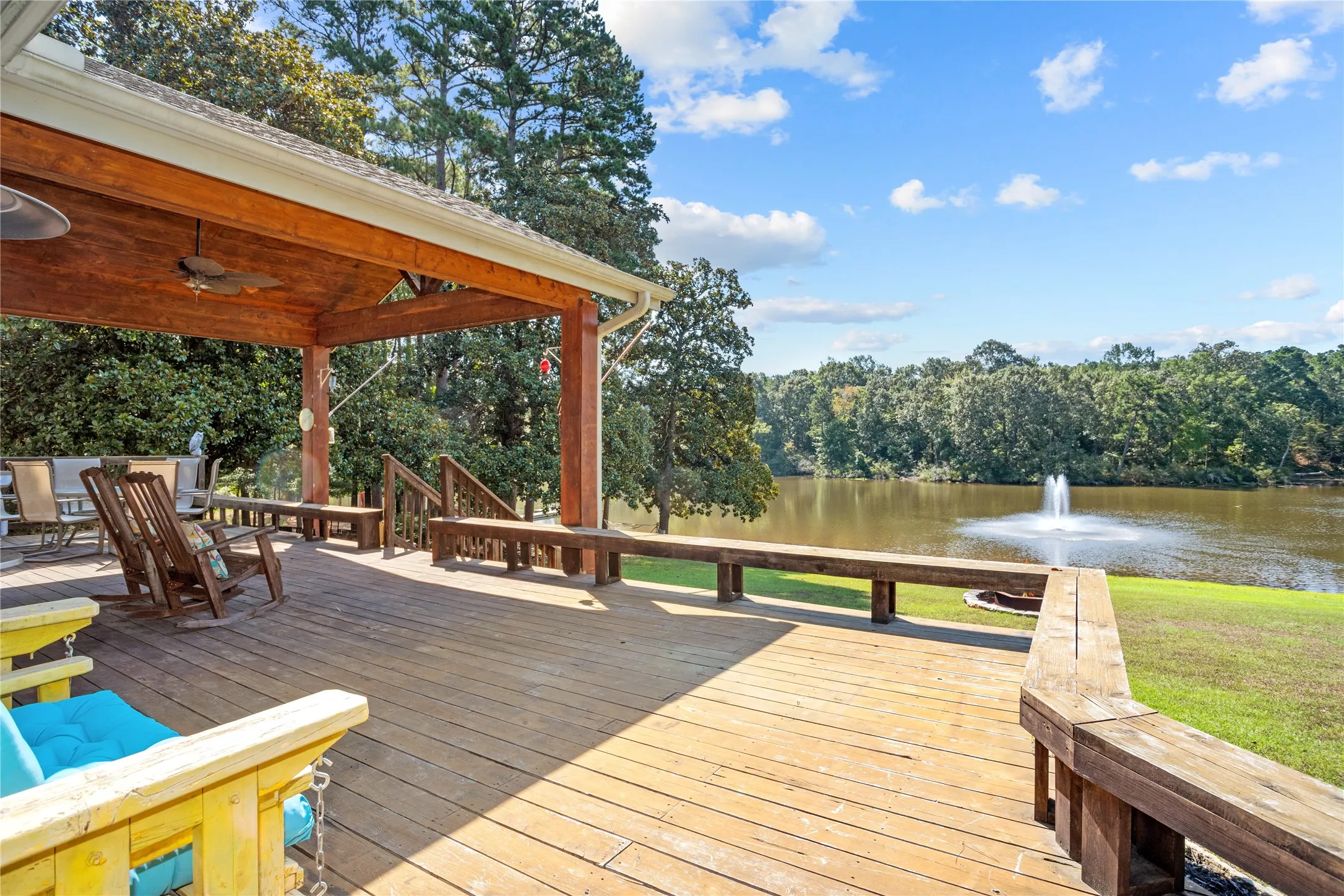Wooden deck featuring a water view