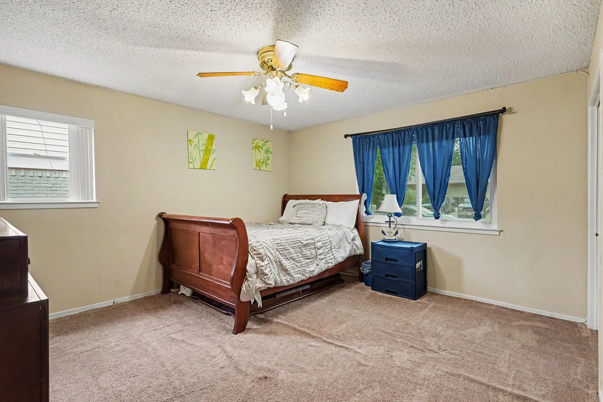Neutral-toned wall paint with carpet flooring