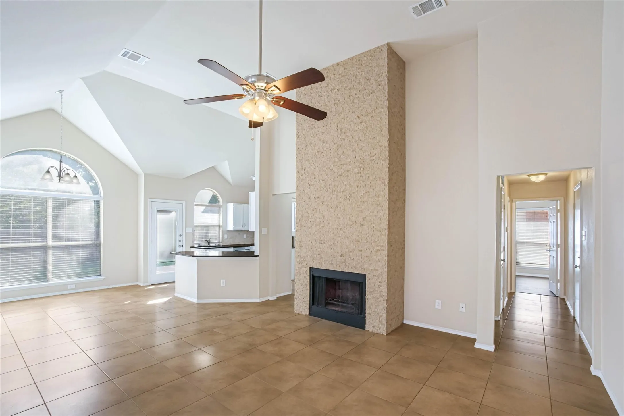 Check out the stone stacked fireplace
