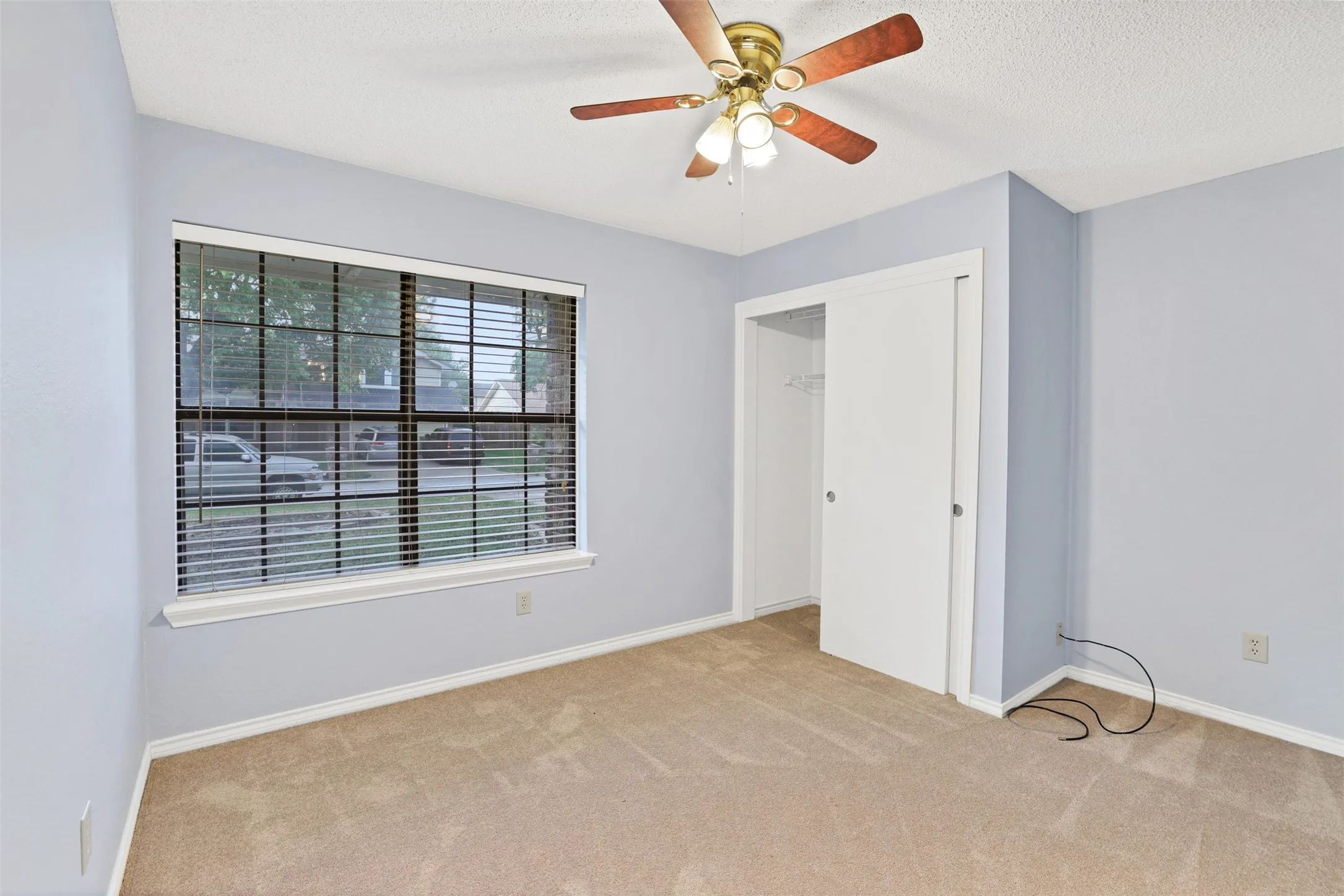 Bedroom with natural light from large window