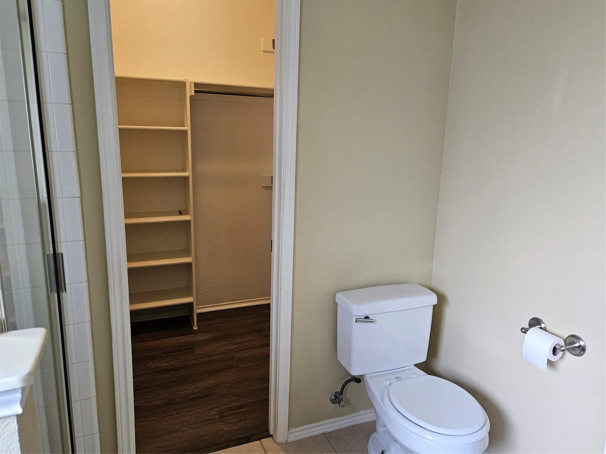 Water closet with tile flooring