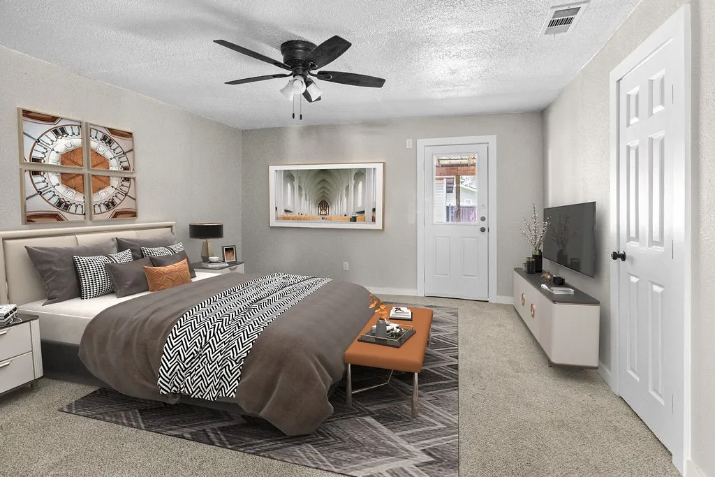 AI generated staging Ceiling fan fixture, exterior access door, carpeted flooring, wall-mounted television, and paneled interior door