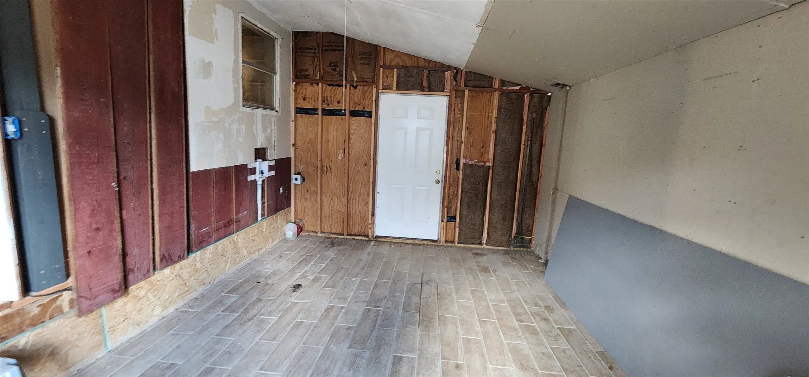 Garage conversion needs finish out. SF is not included (not vented for hvac).