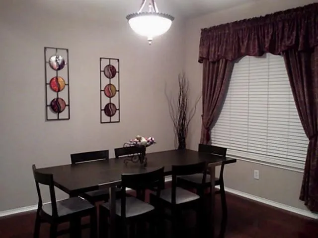 Wood-finish flooring with light-toned wall paint