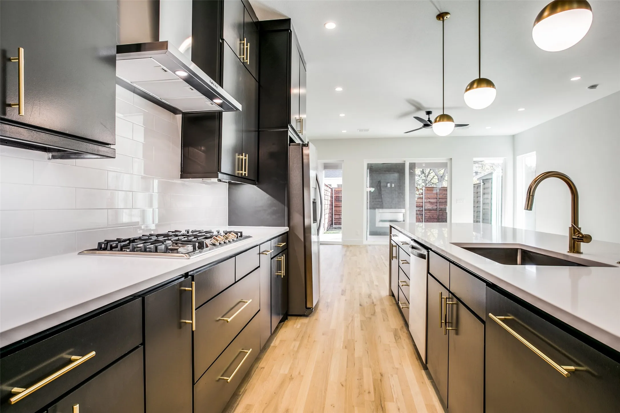 Lots of storage in this wonderful space complete with large farm sink, dishwasher, gas cook top and refrigerator.