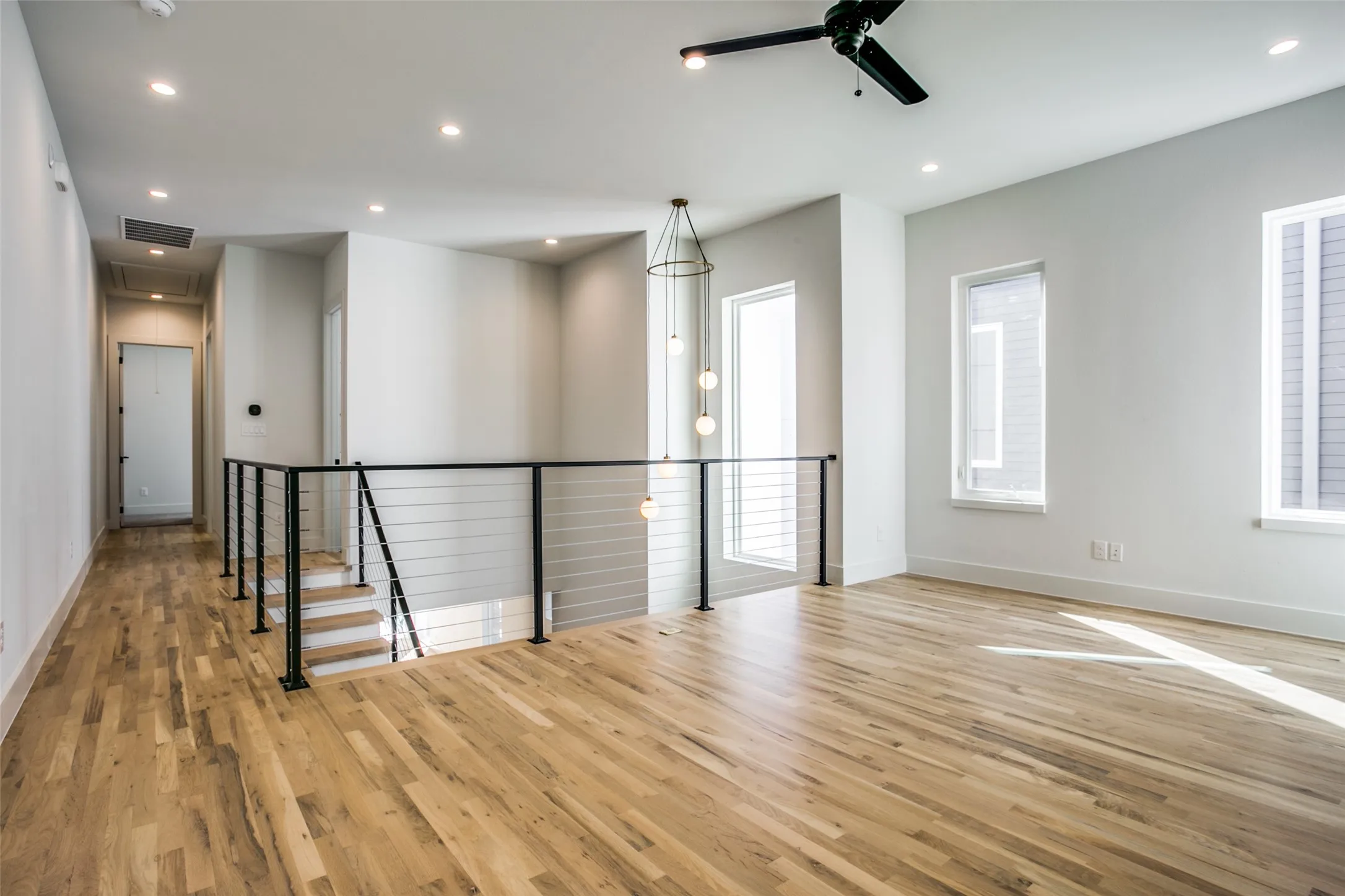 This expansive loft provides homeowner with wonderful flex space to use in many ways. 2nd living/office/guest quarters.