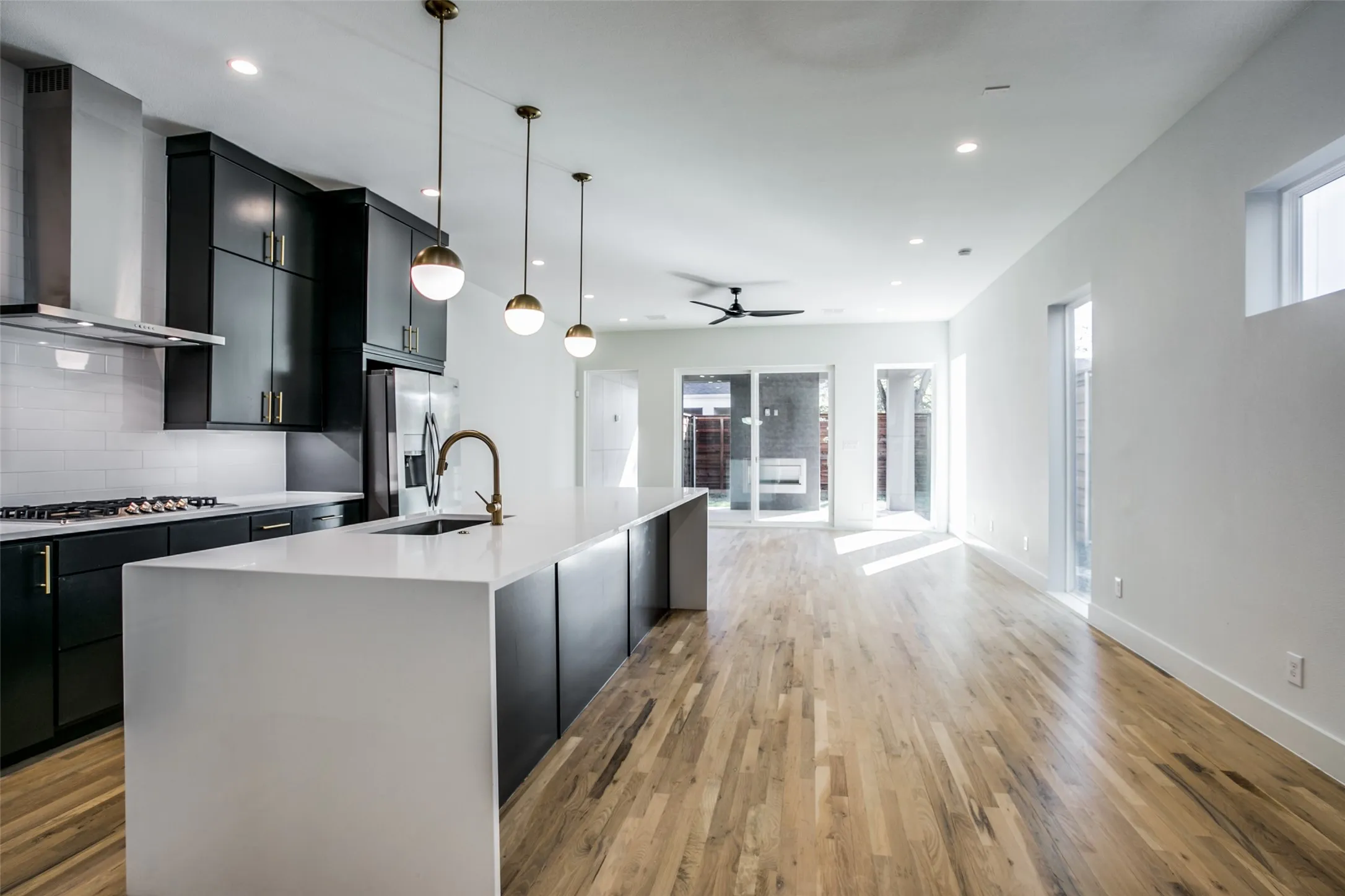 Wonderful open floor plan with xl island for additional dining space. Can you see the fireplace on the back patio?