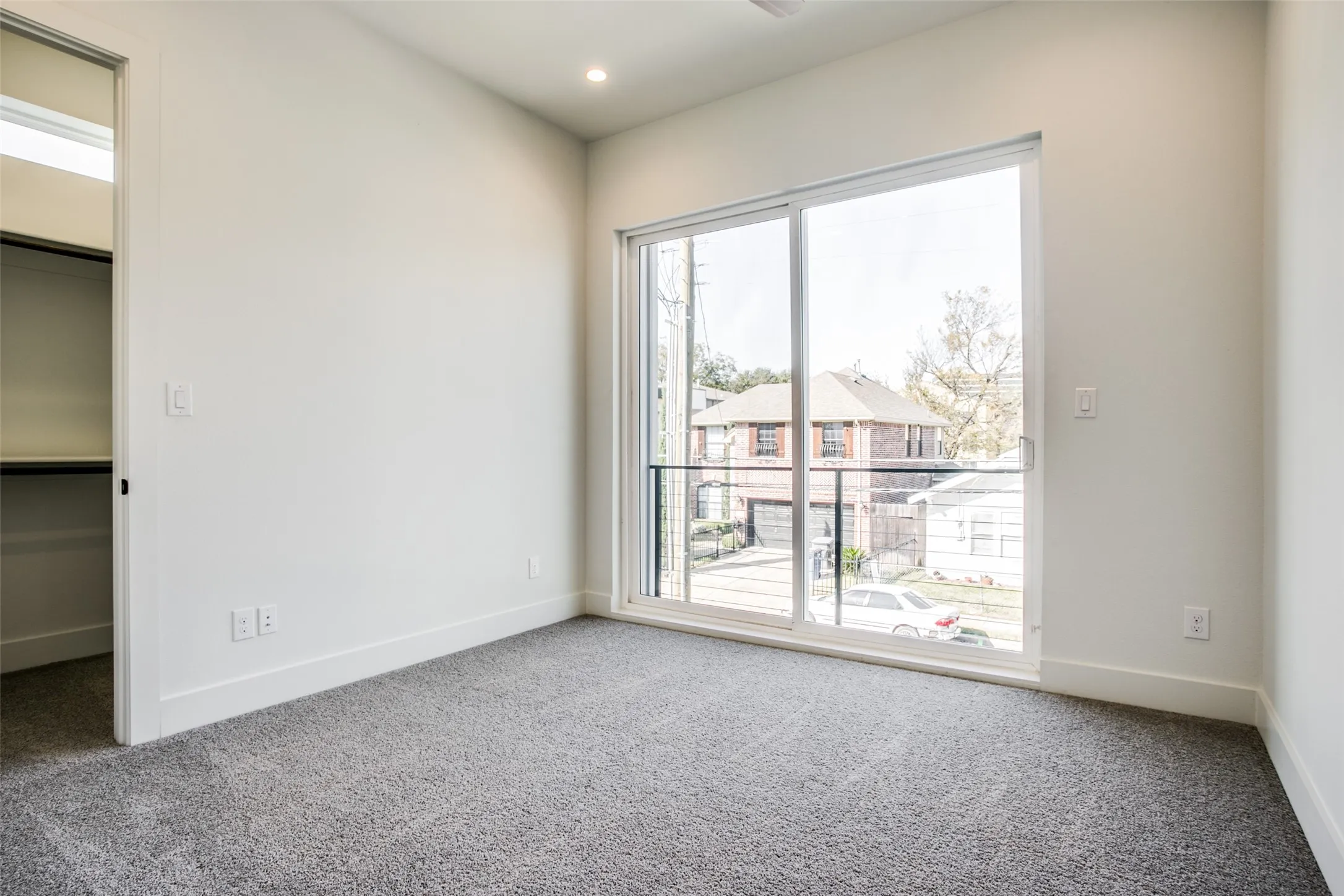 Wonderful secondary bedroom with a wall of light and large walk in closet. Carpet recently replaced.