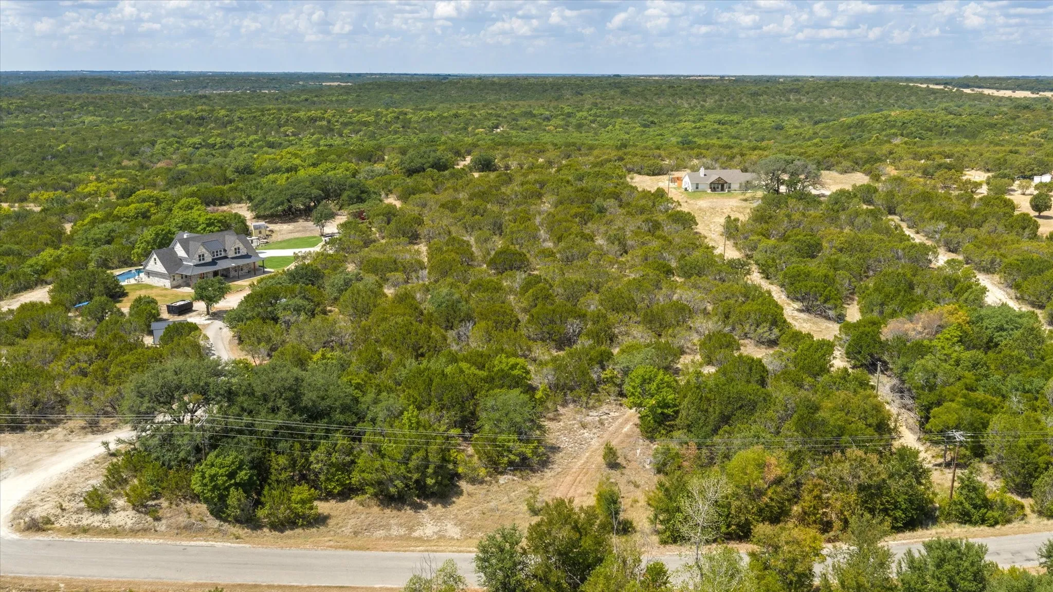 Expansive natural landscape with varied tree coverage