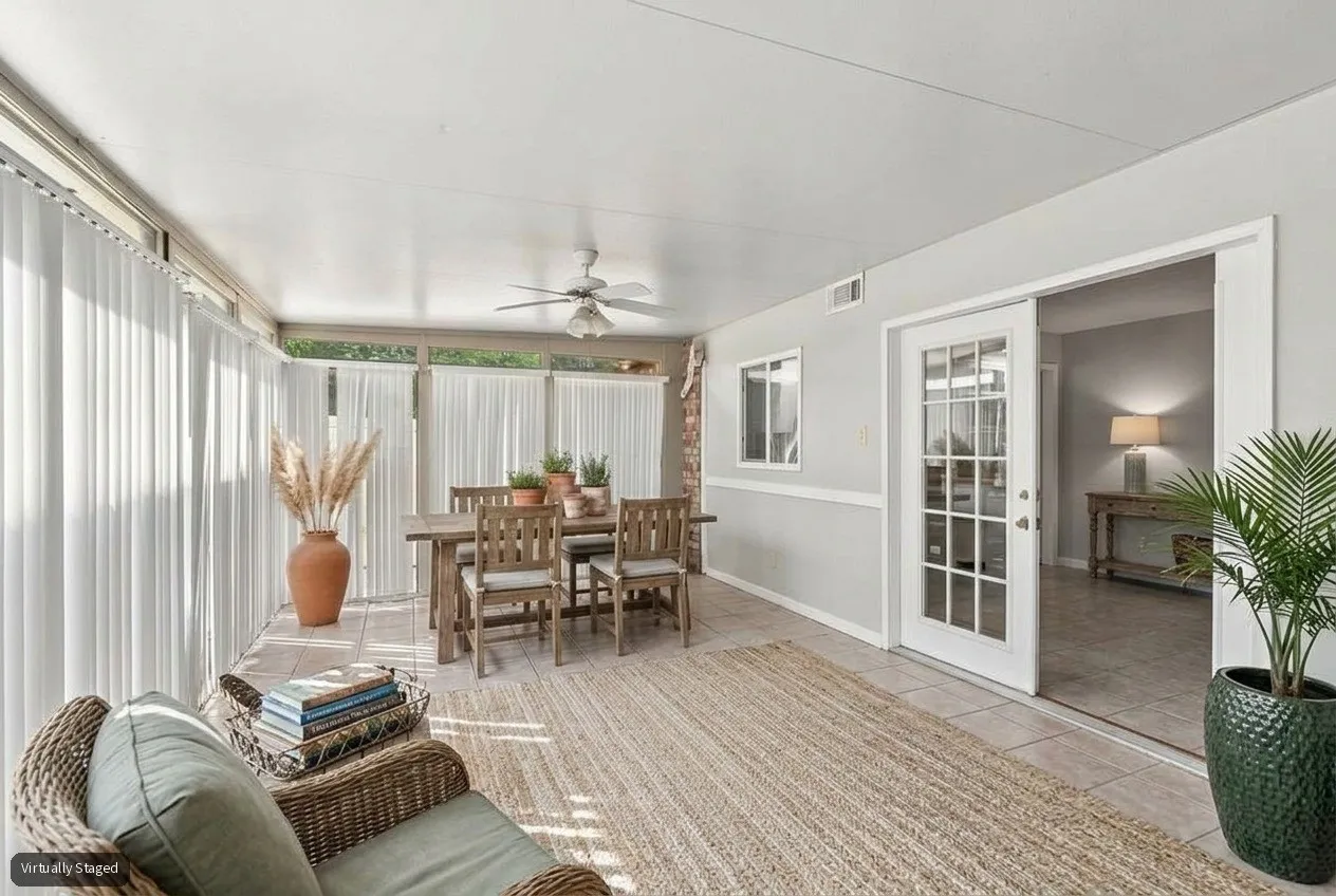 Virtually Staged sunroom with HVAC and electric. Perfect flex space for work, play or leisure!