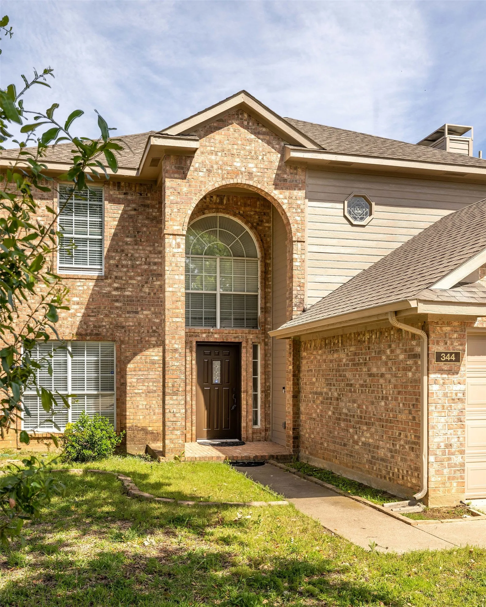 View of front of home featuring a front lawn