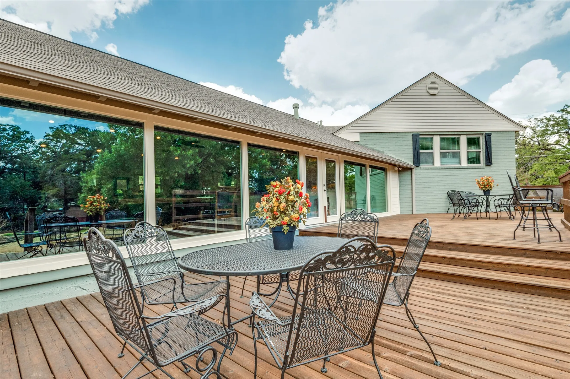 Multi-level wood decking with exterior access