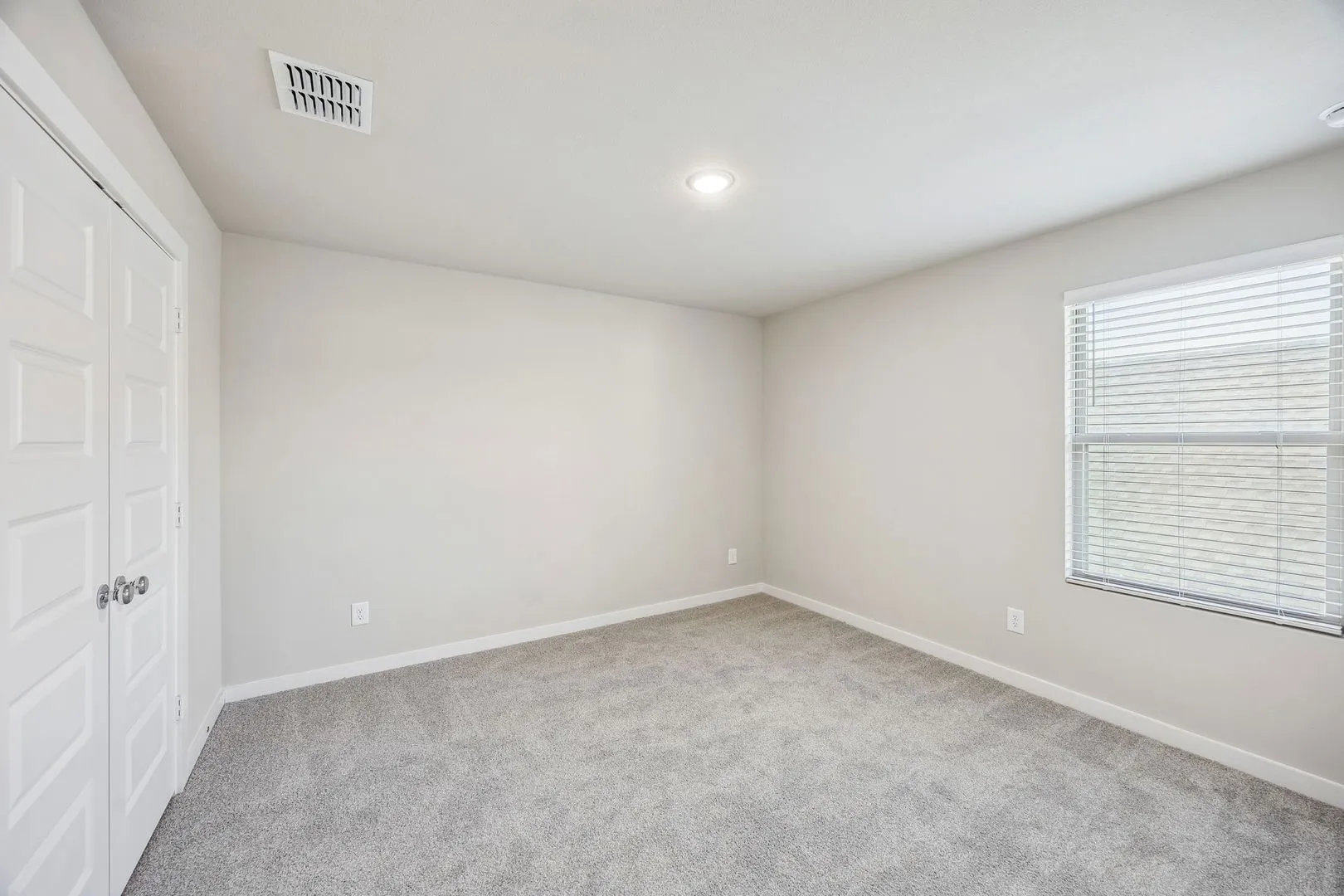 Bedroom in the Willow home plan by Trophy Signature Homes – REPRESENTATIVE PHOTO