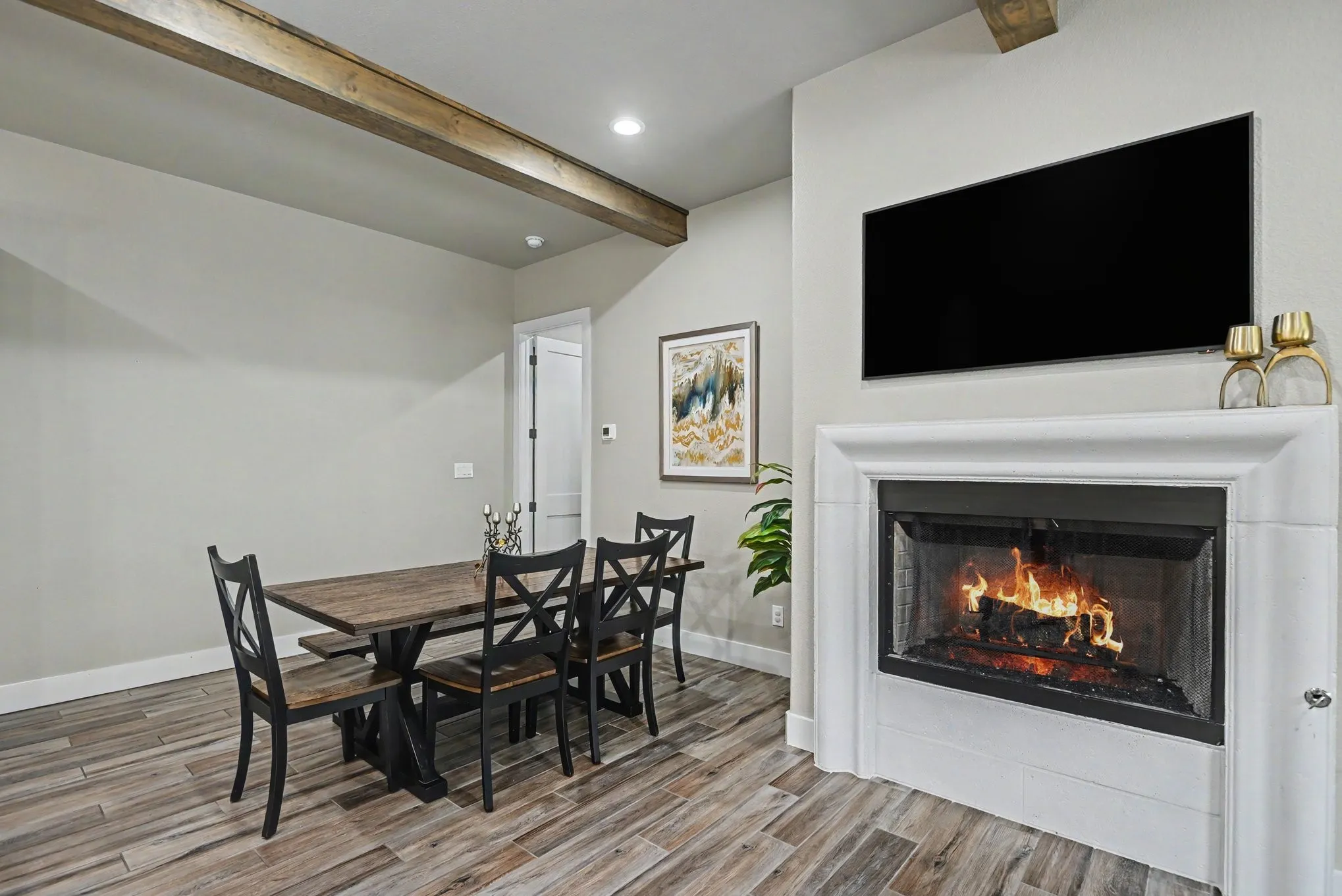Dining room next to cozy fireplace