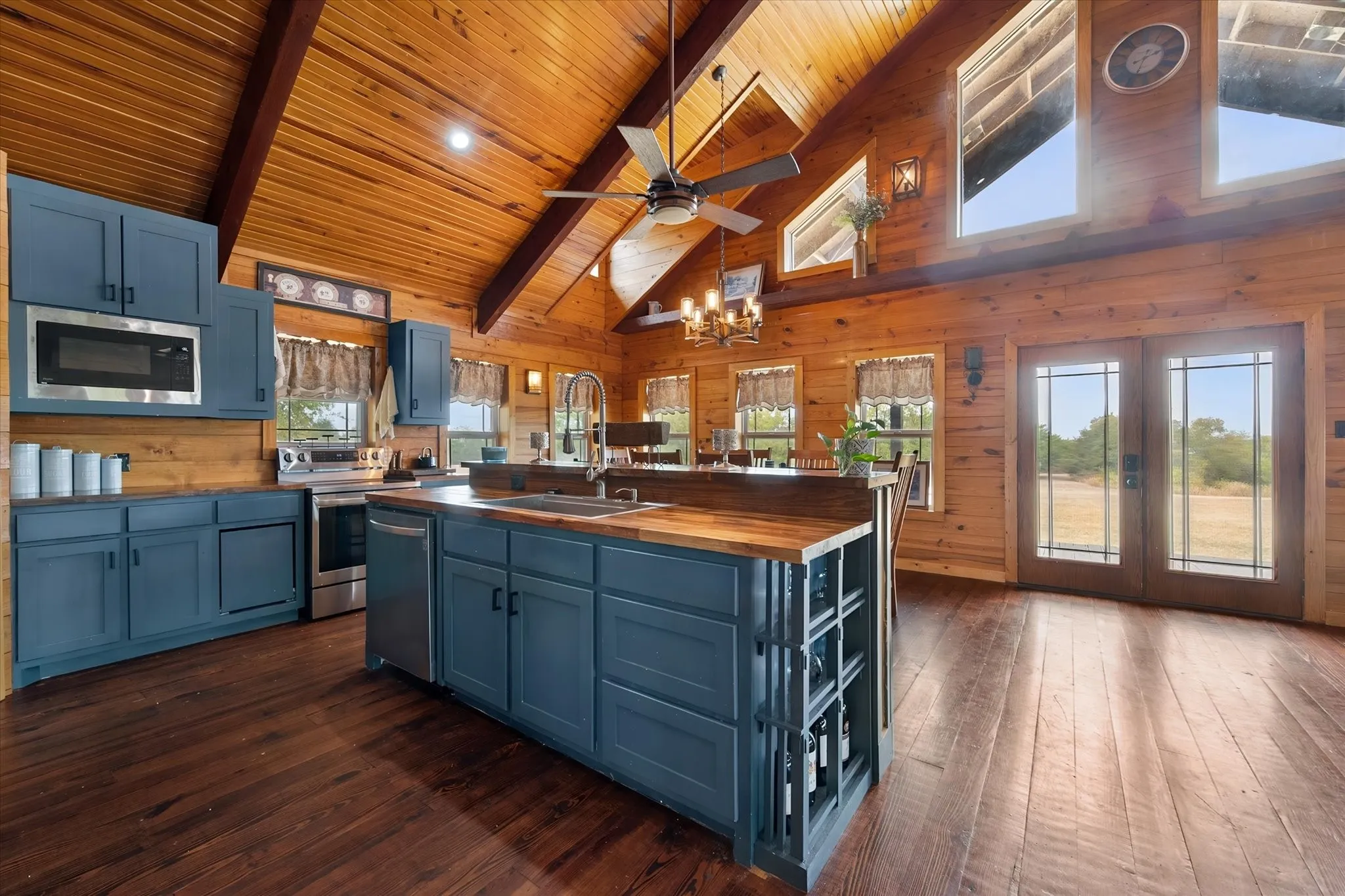 Vaulted wood-paneled ceiling with exposed beams