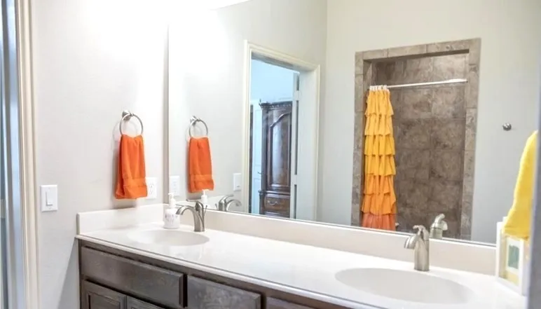 Primary bathroom showing dual sinks
