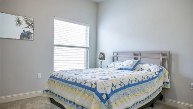 Secondary bedroom showing queen size bed