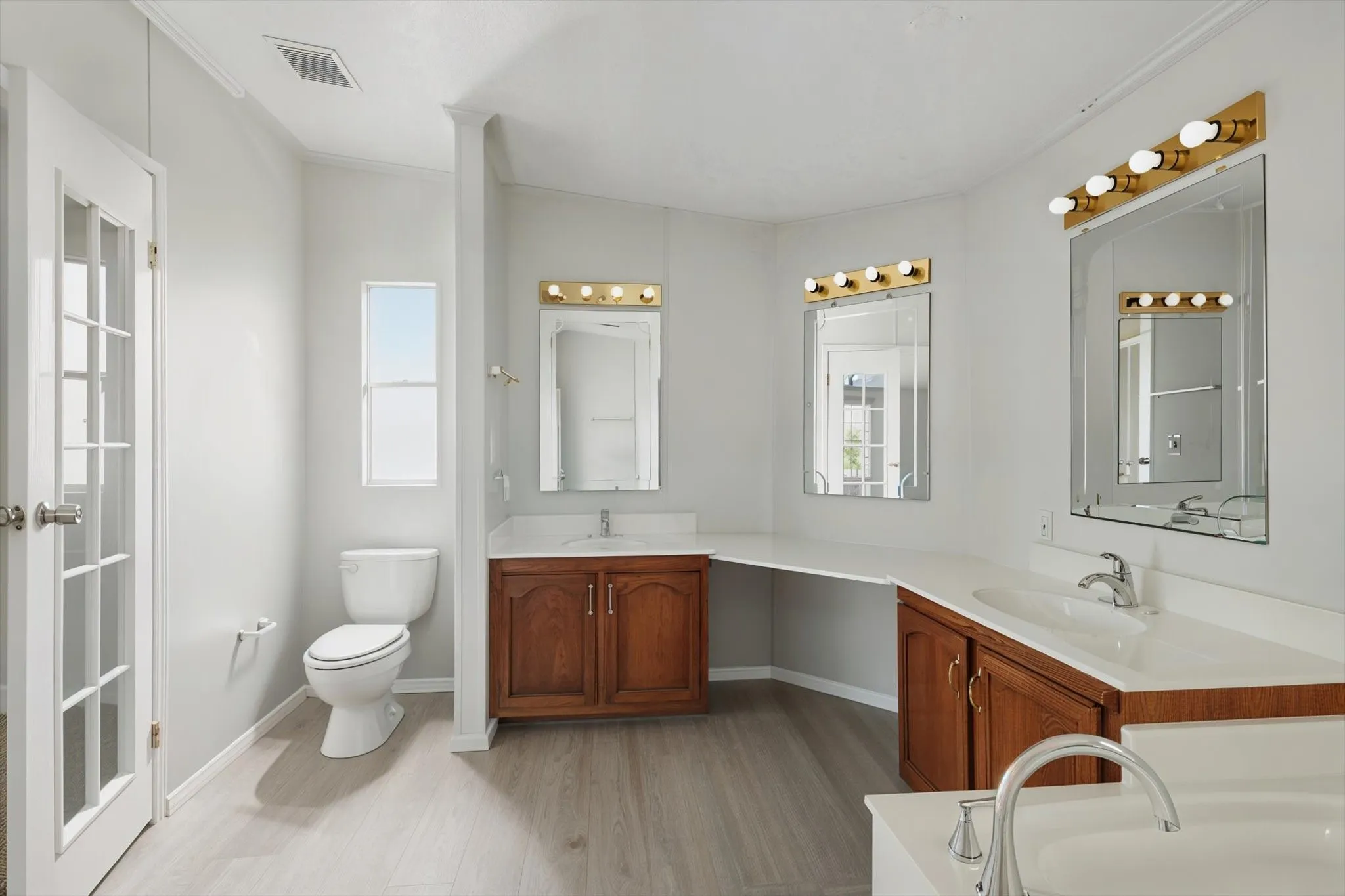 Primary bathroom has lots of space and double vanities!