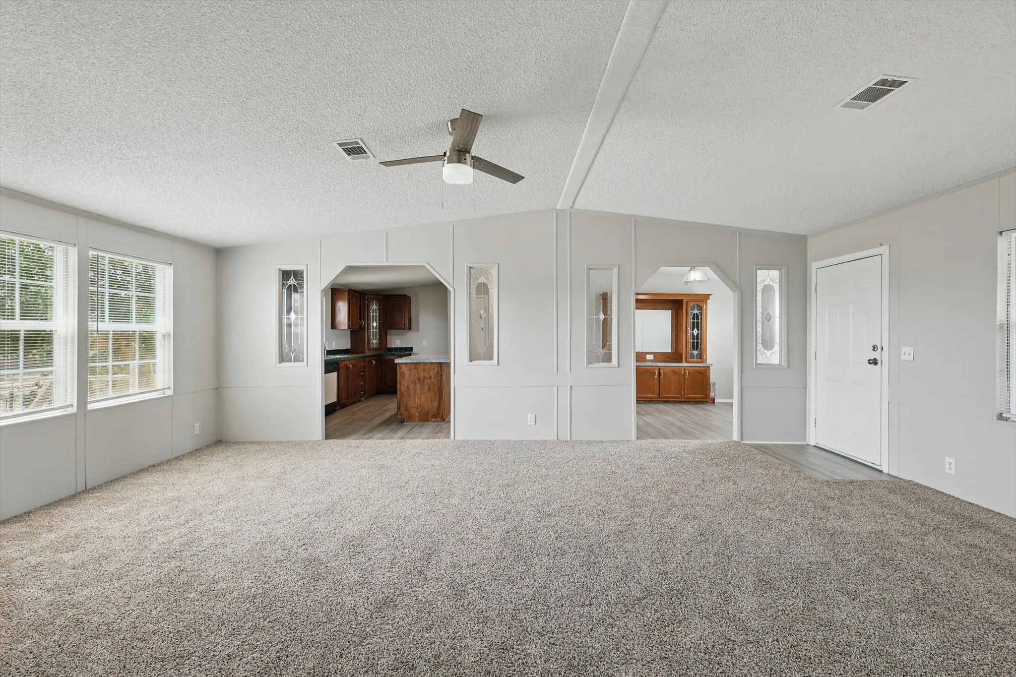 View from the living room towards the kitchen and dining room