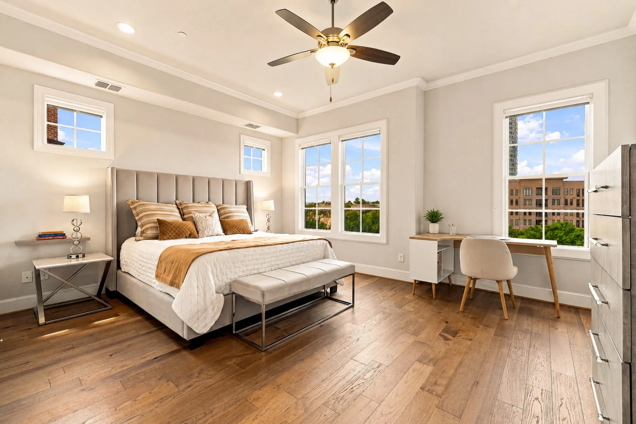 Spacious primary bedroom with room for sitting area or work space.