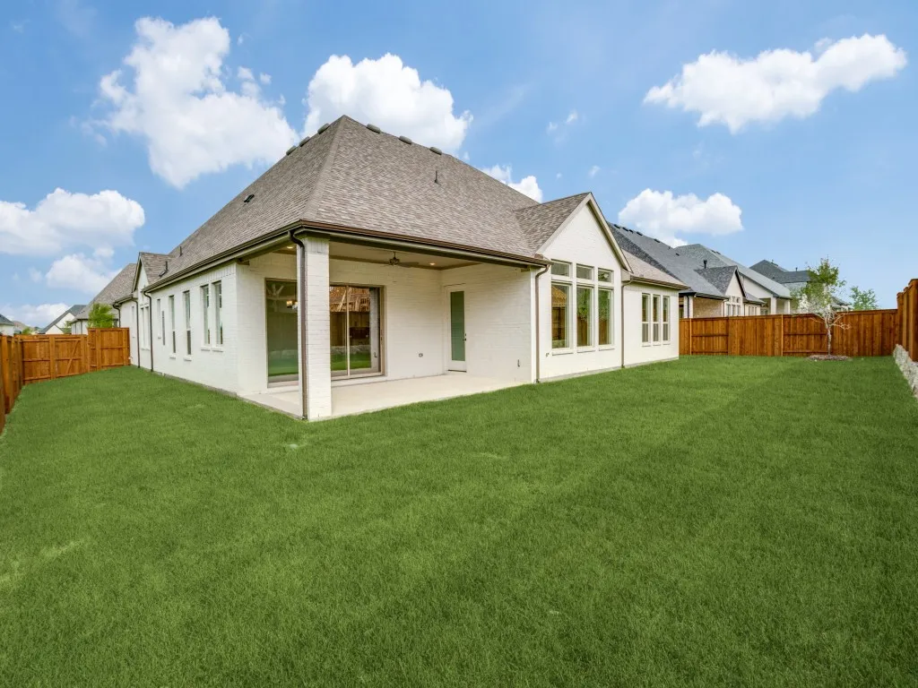 Friends and family will love getting together for endless summer fun in this fabulous back yard featuring oversized covered back patio and private fenced yard!