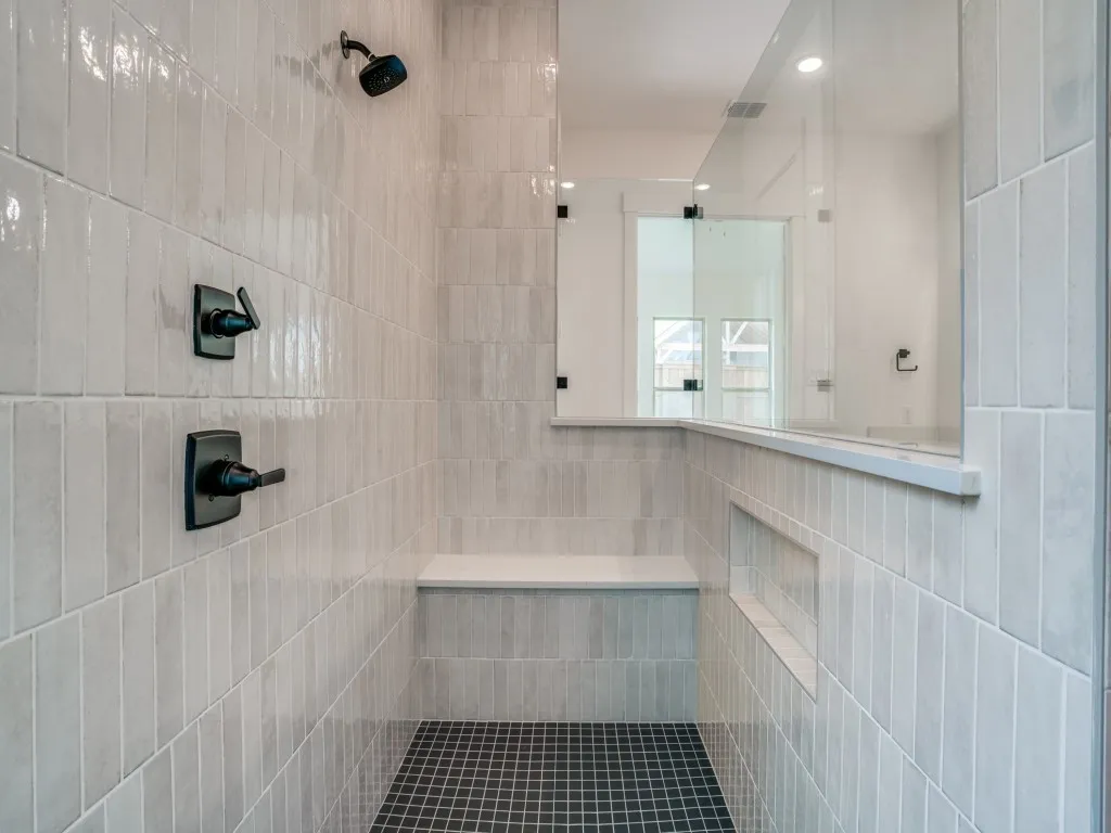 Featuring a beautifully finished oversized walk in owner's shower with dual shower heads, this is the perfect place to start or end your day!
