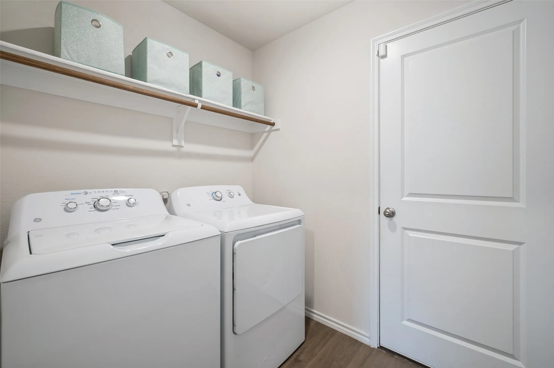 Laundry room with door leading to garage!