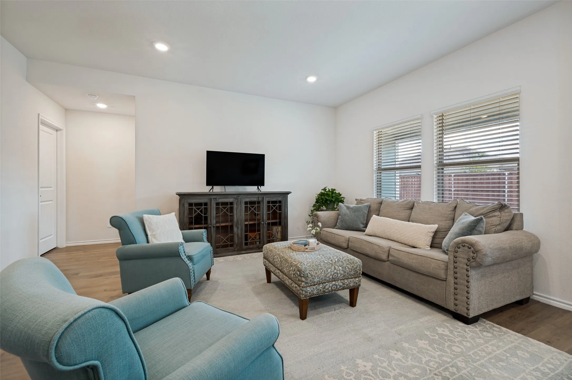 Living room has windows to view backyard!