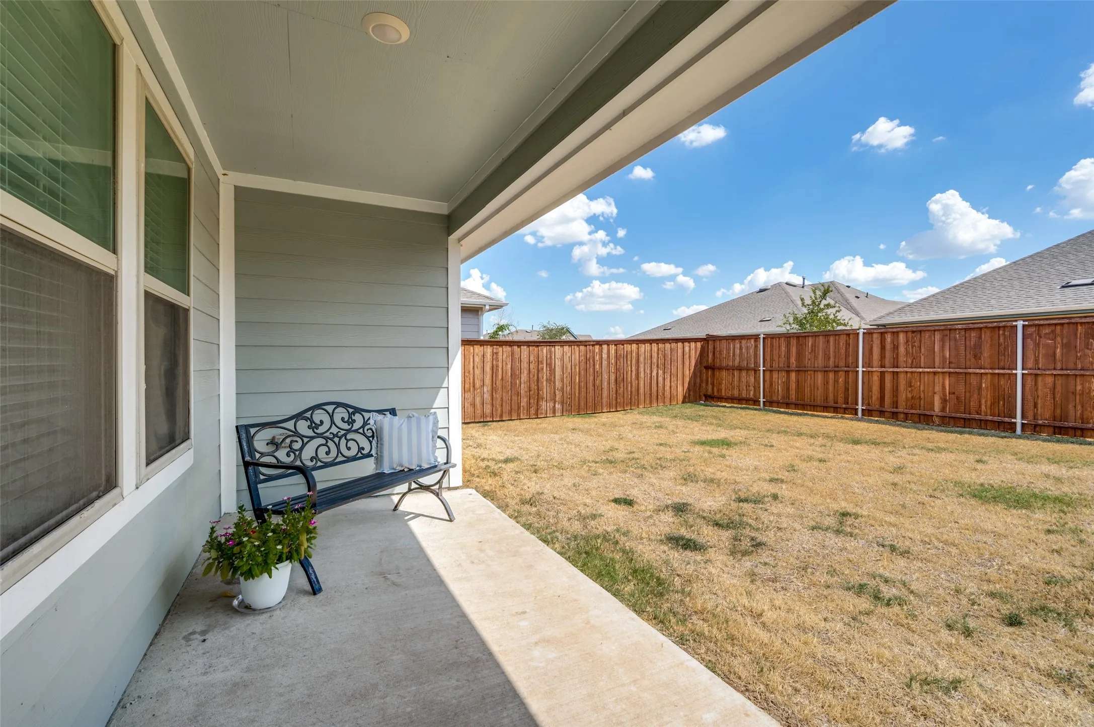 Nice covered patio space and fenced backyard!
