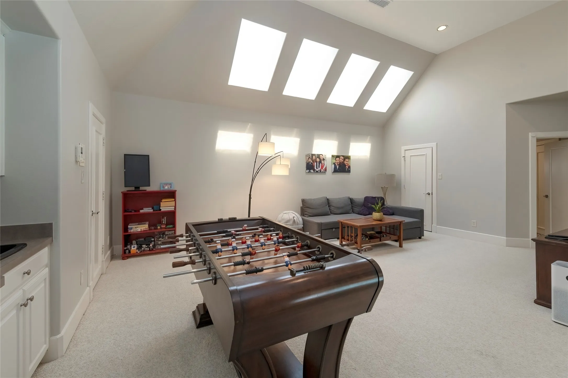 Game Room with built ins and 2 closets