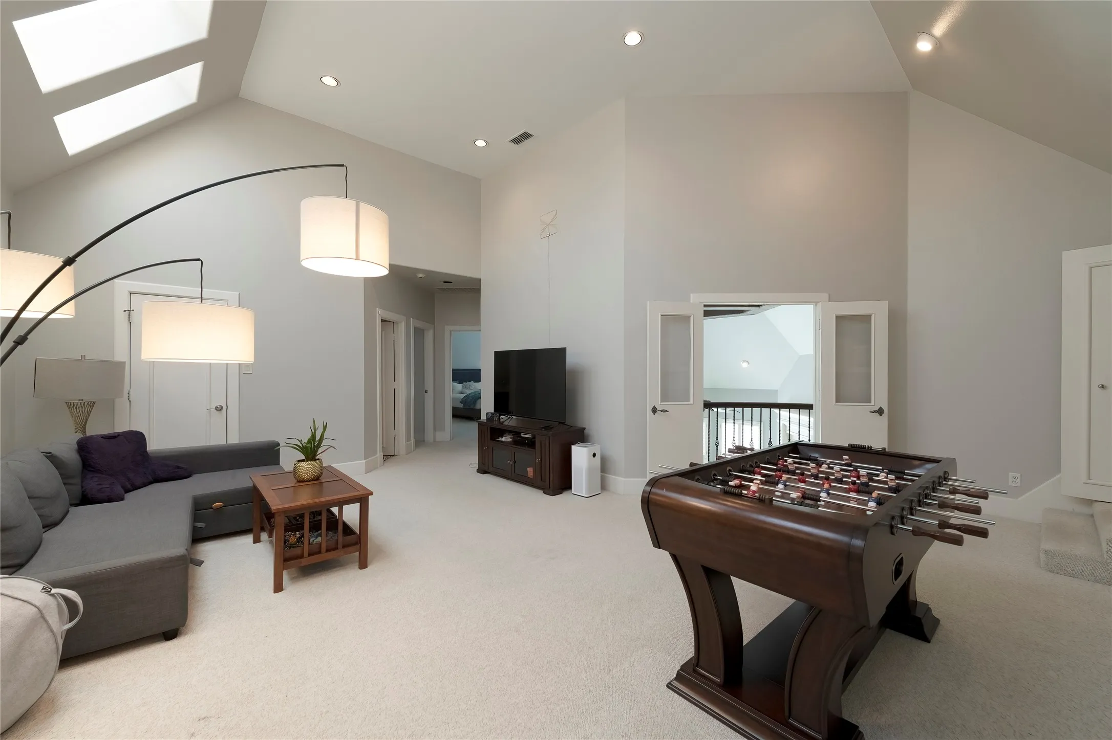 Game Room with build ins and 2 closets for storage