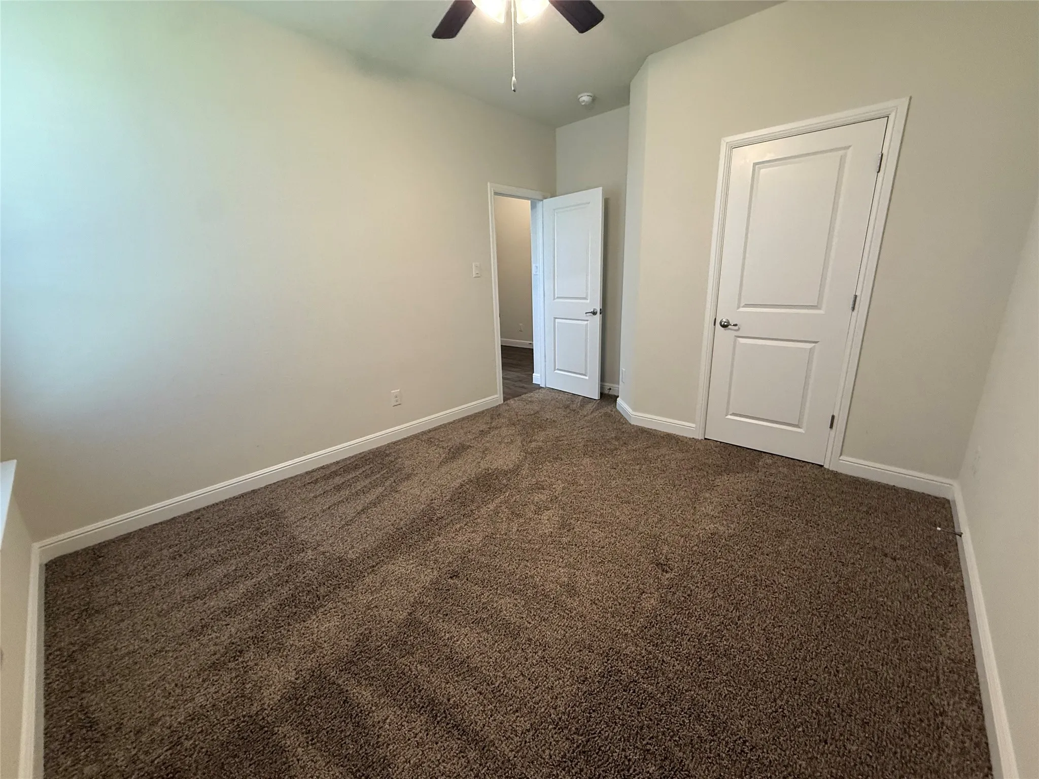 Neutral-toned walls with contrasting white trim