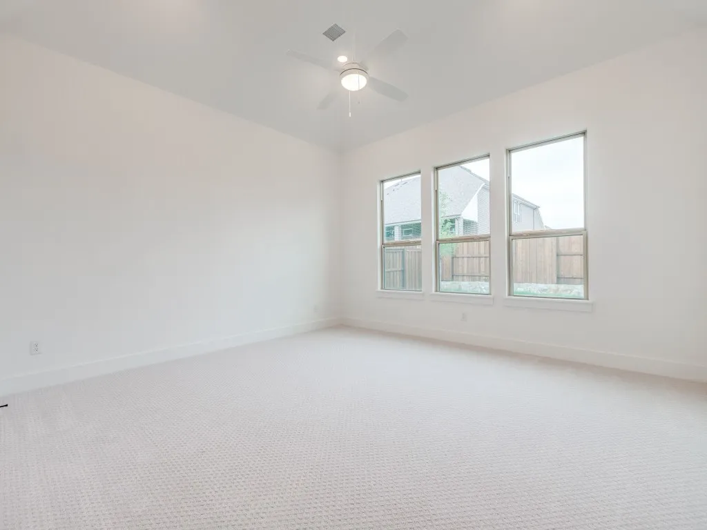 Your dreamy owner's suite is located at the rear of the home for additional privacy.