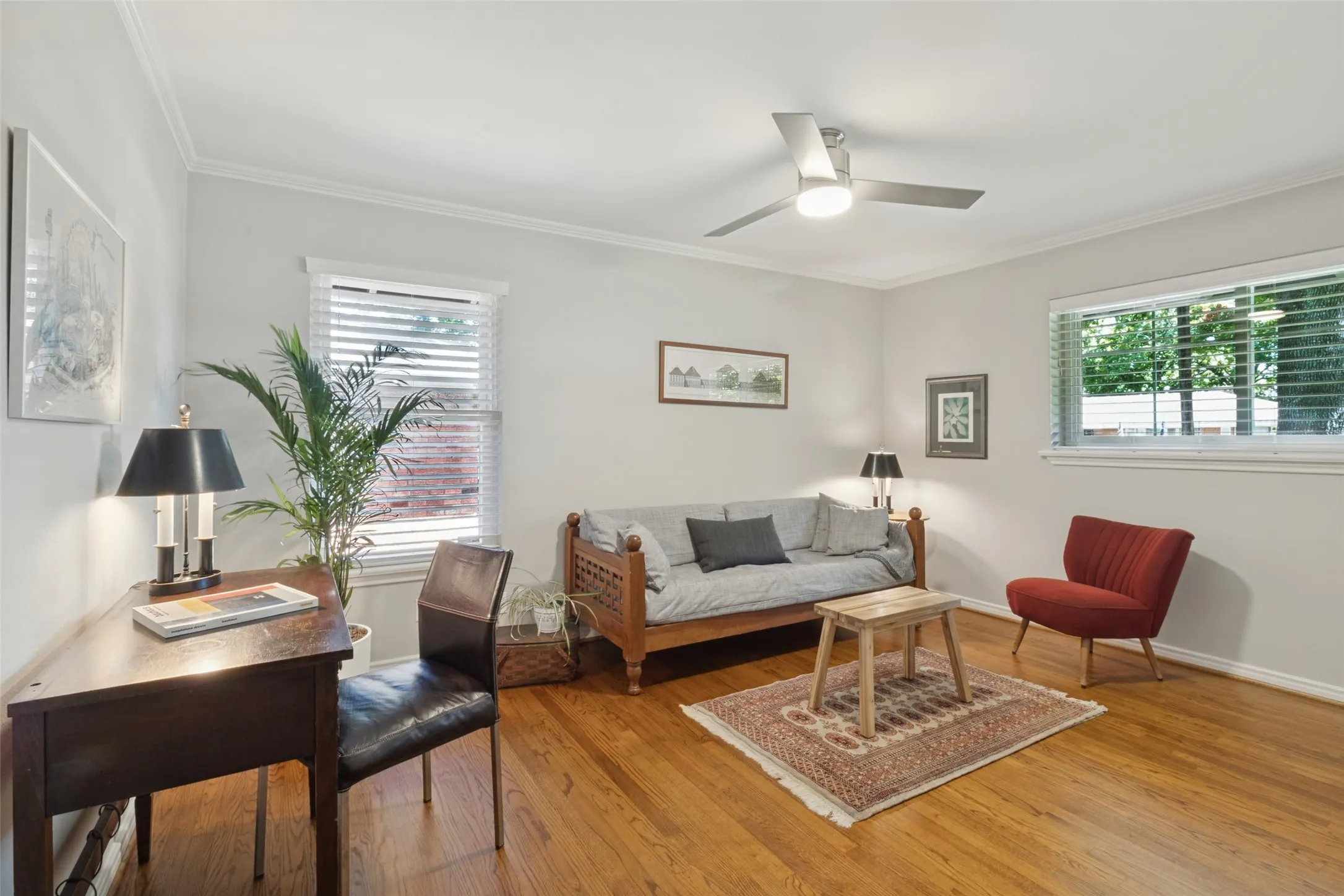 Hardwood flooring, recessed lighting, ceiling fan, built-in closet shelving, and a dual-pane window