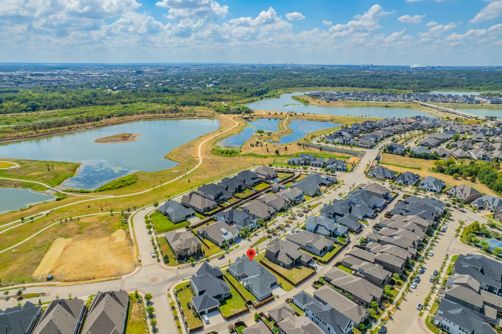 Residential neighborhood with a lake and green spaces