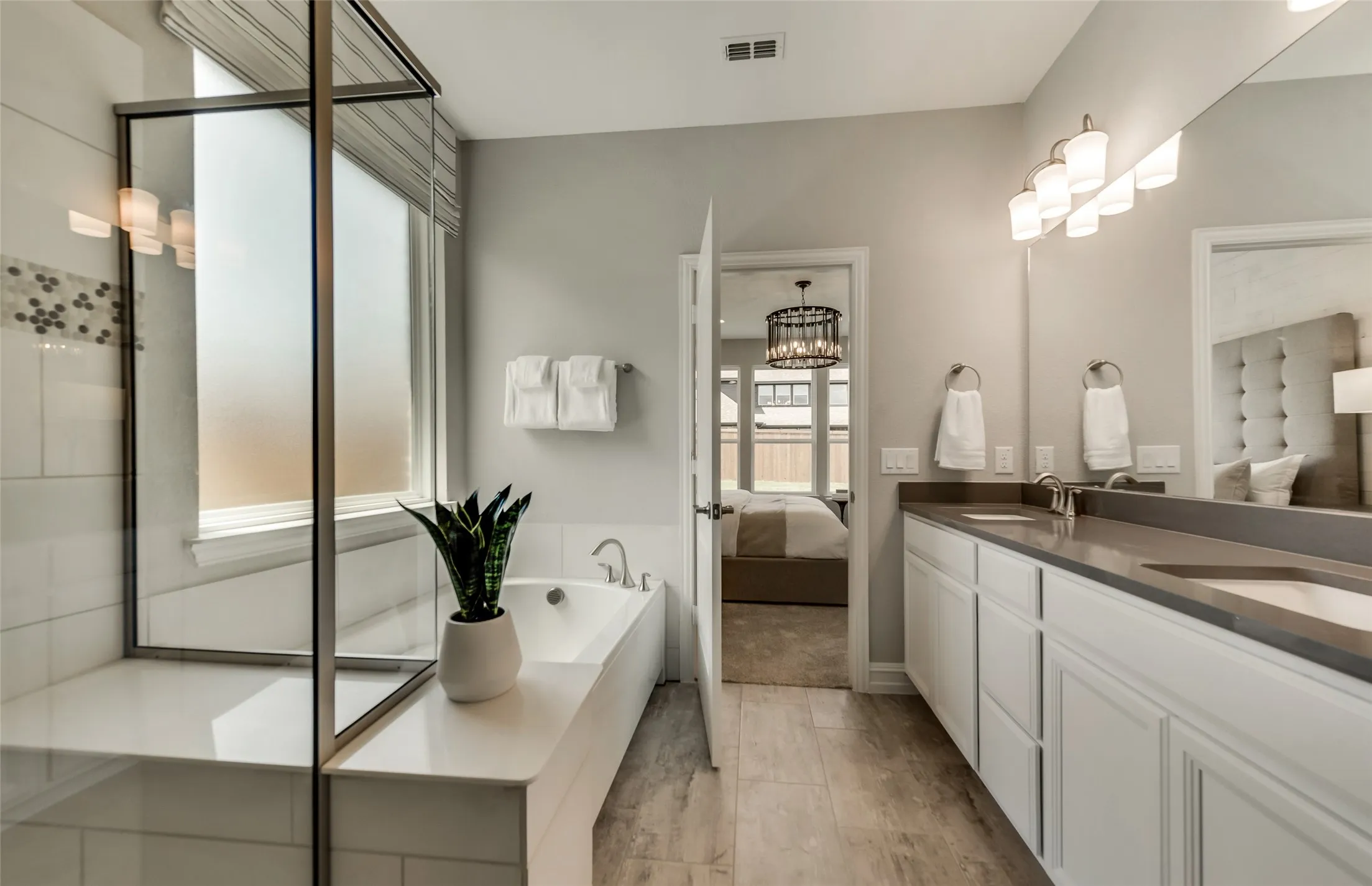 *Model Representation - Owner's private bath with double vanity