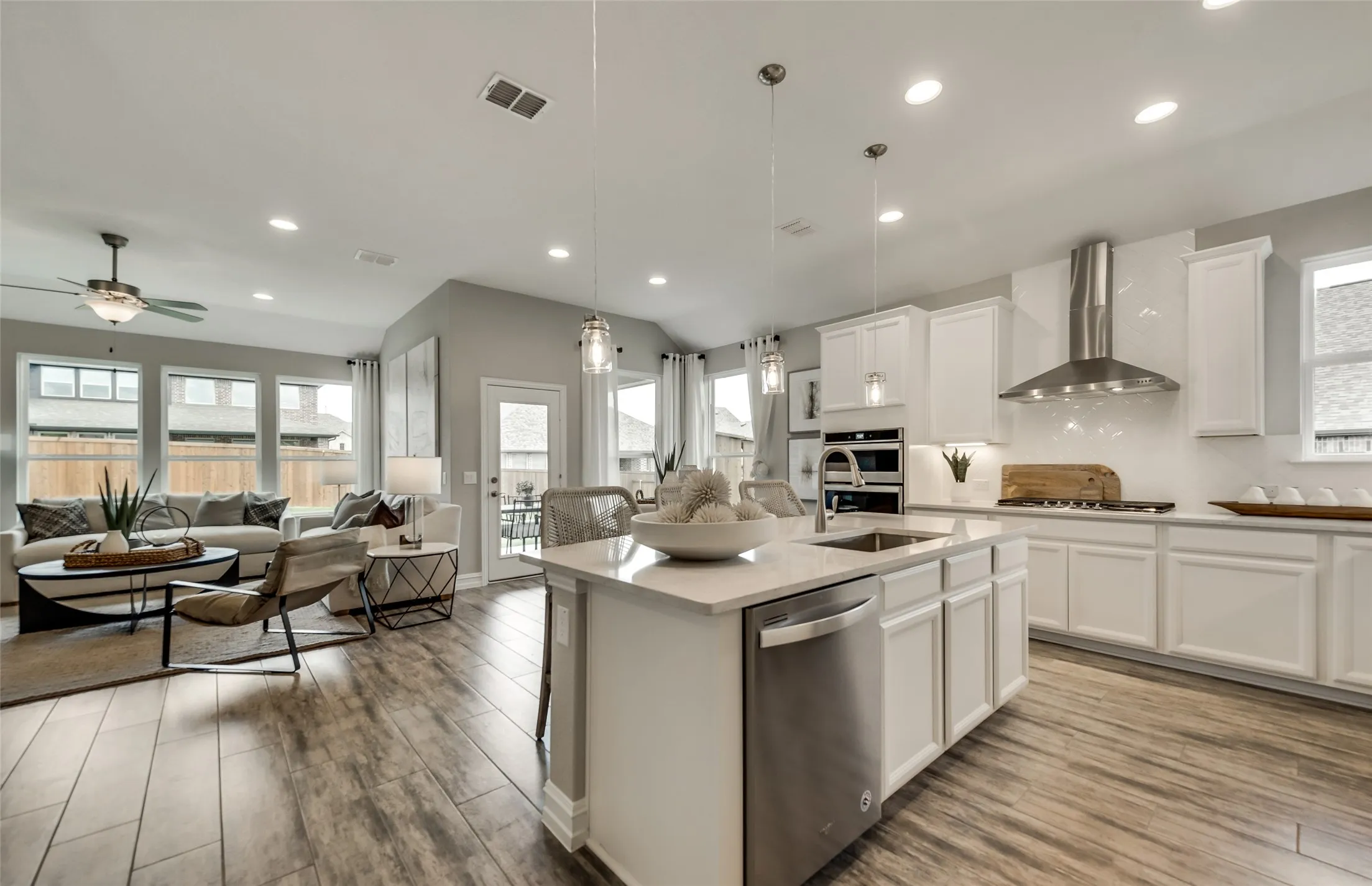 *Model Representation - Large island overlooking gathering room and dining areas