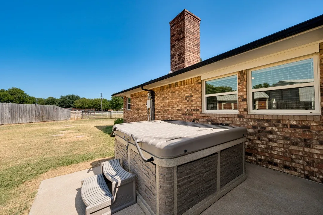 Hot tub off of the patio