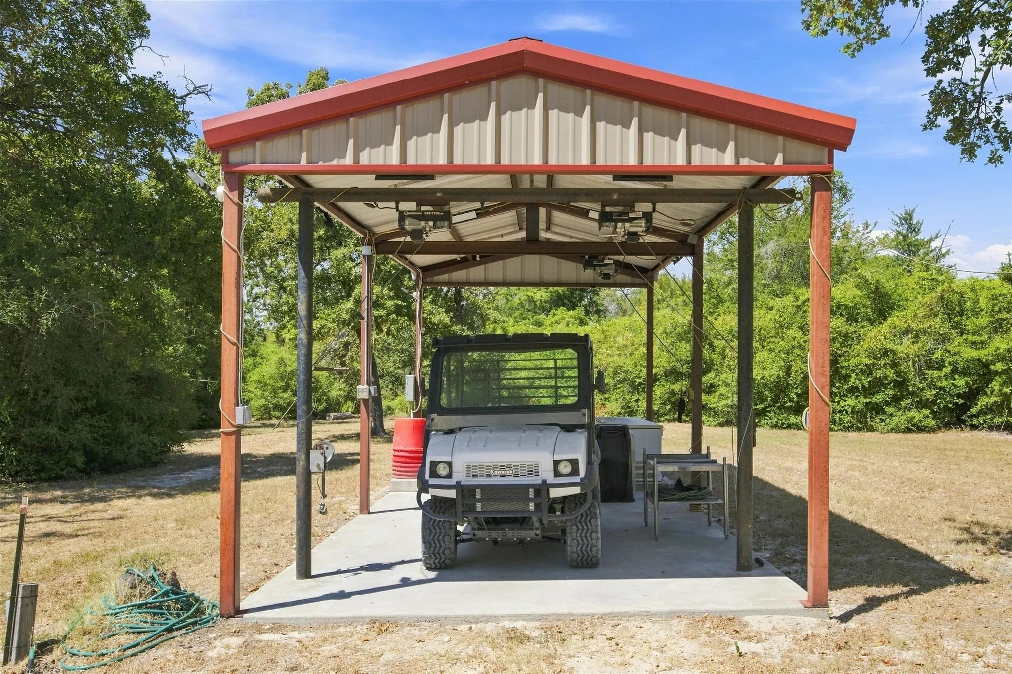 Cleaning station with 3 winches, water and power along with included Kawasaki Mule