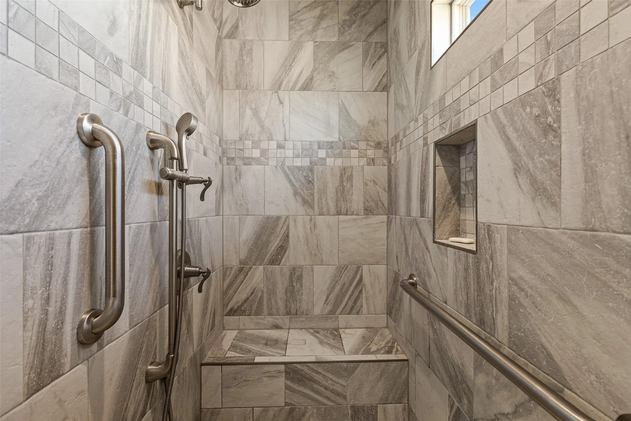 Bathroom with a tile shower