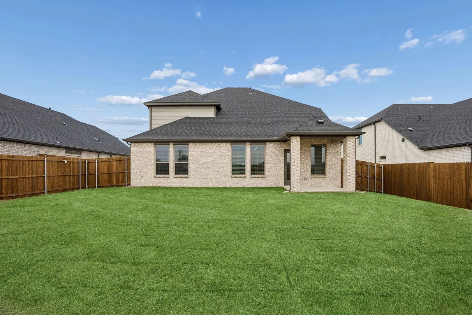 Covered Patio in the Masters home plan by Trophy Signature Homes – REPRESENTATIVE PHOTO