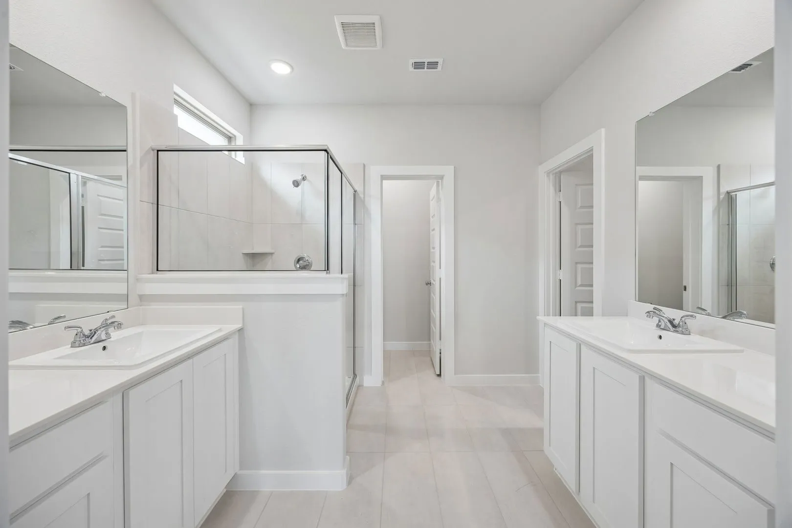 Primary Bathroom in the Masters home plan by Trophy Signature Homes – REPRESENTATIVE PHOTO