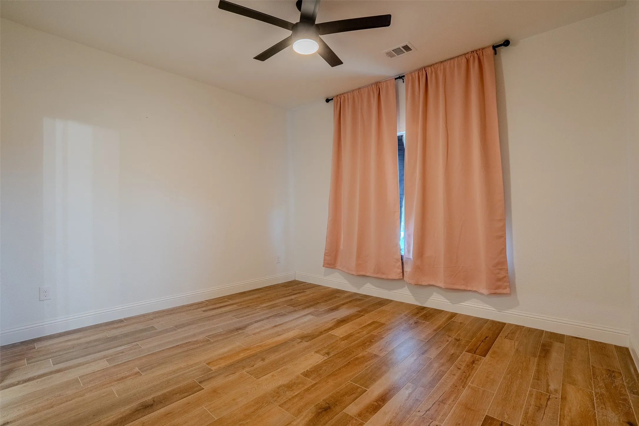 Bedroom #3, Wood-look tile flooring,