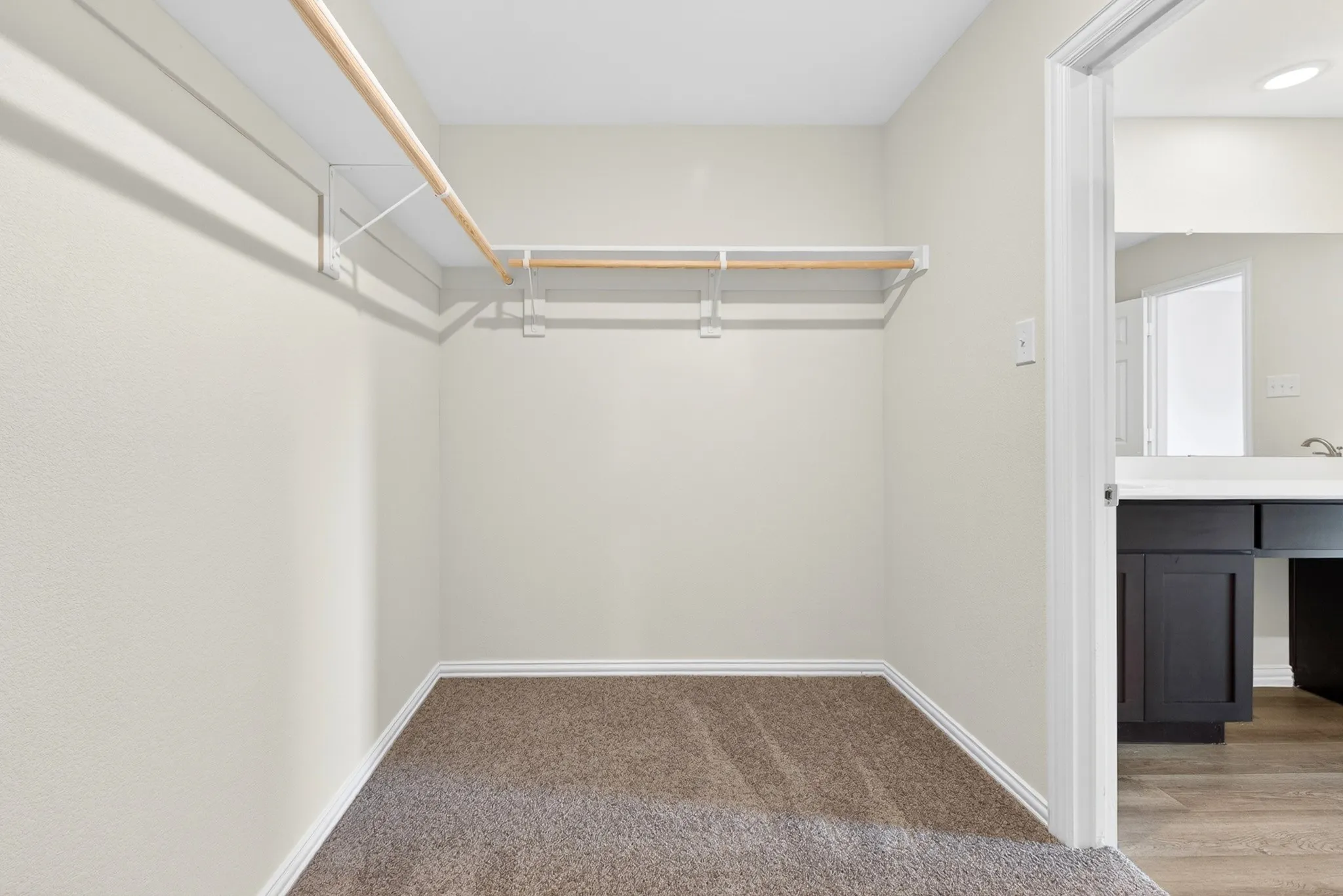 Built-in closet shelving and hanging rods