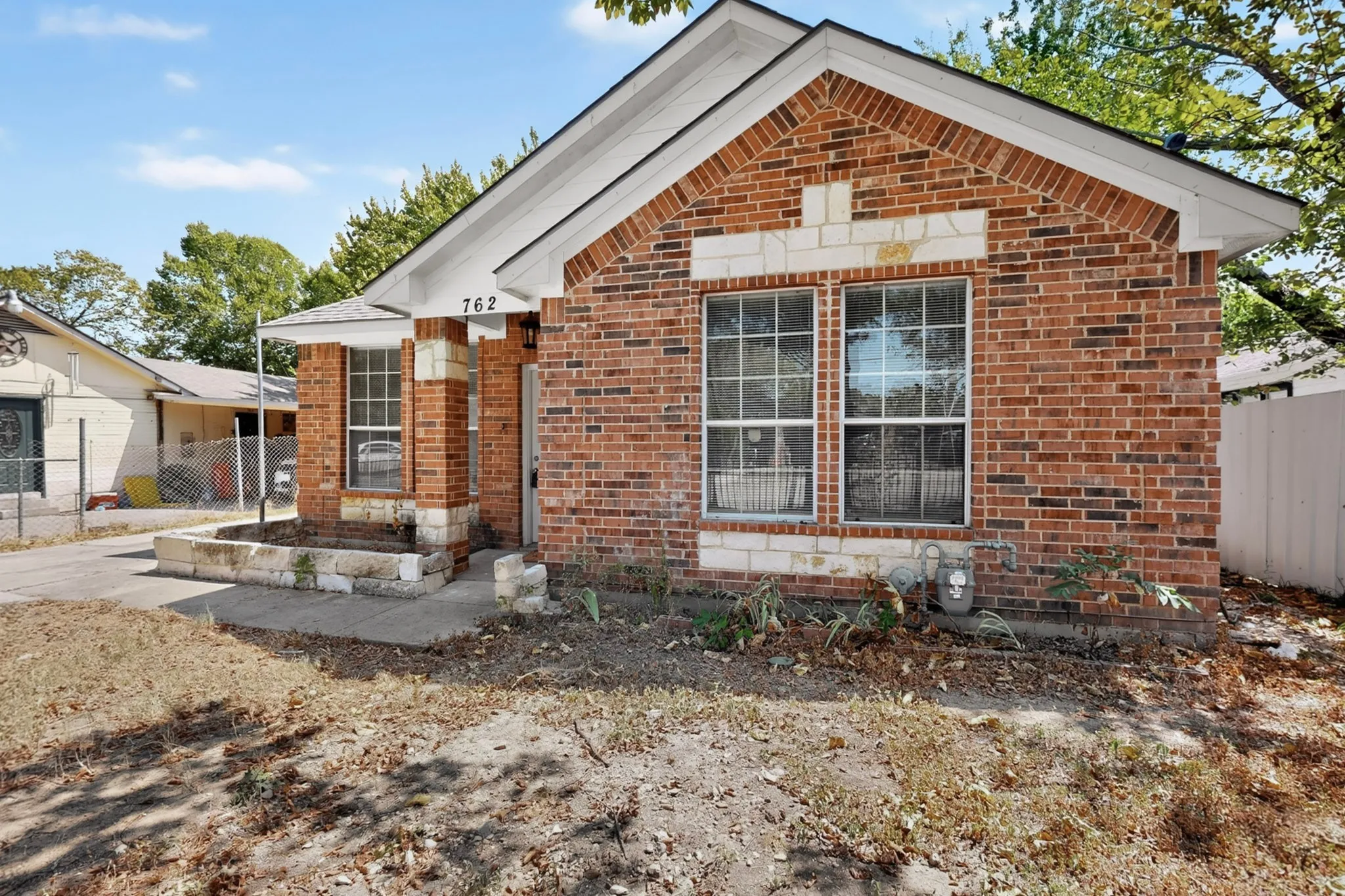 Brick exterior with light-colored stone accents
