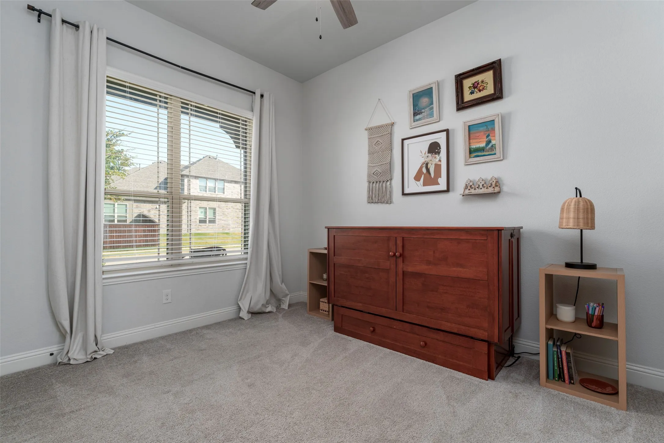Large front bedroom is perfect for your guests or for a study.