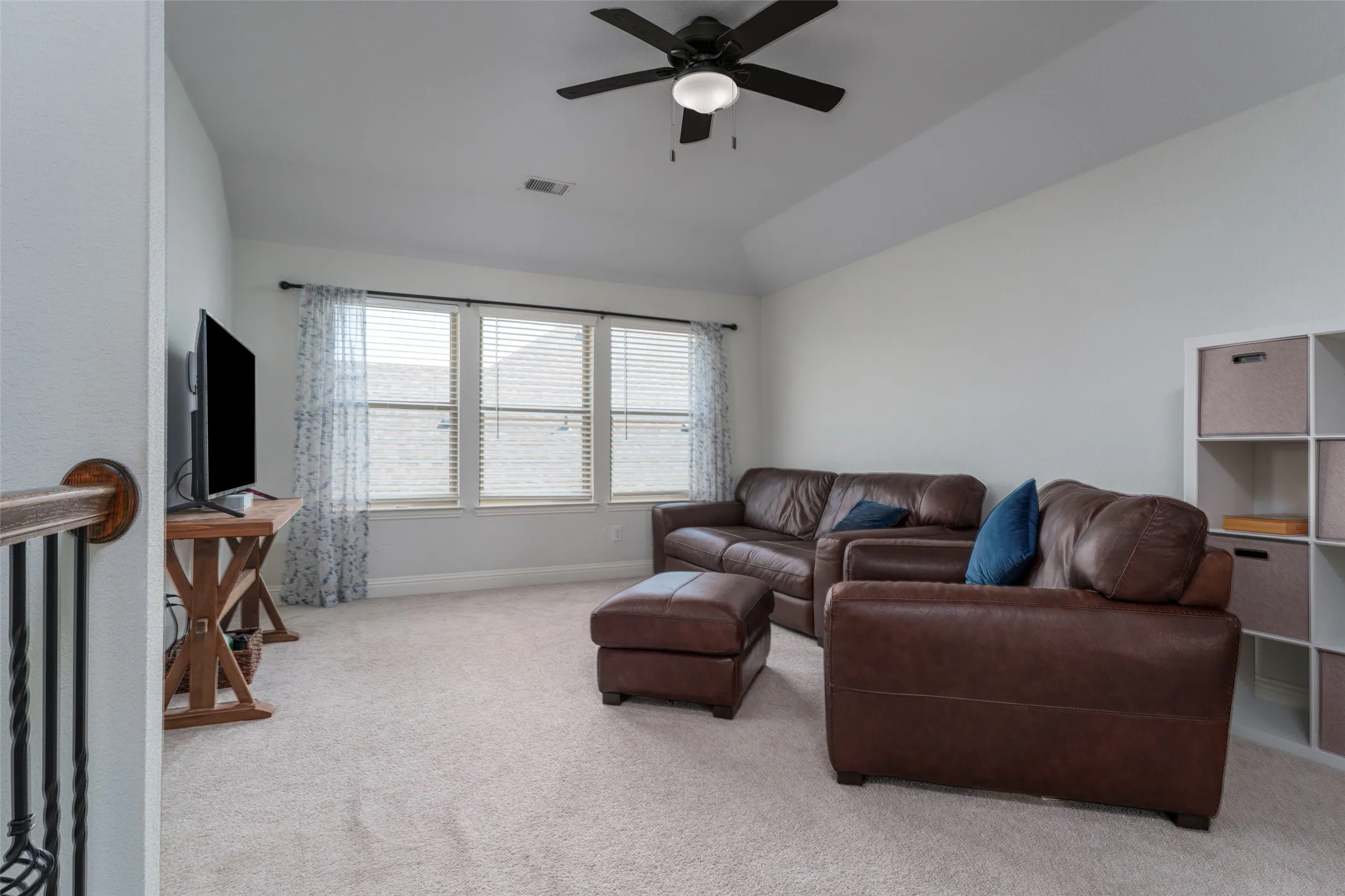 Game room ready for tv watching or a pool table.