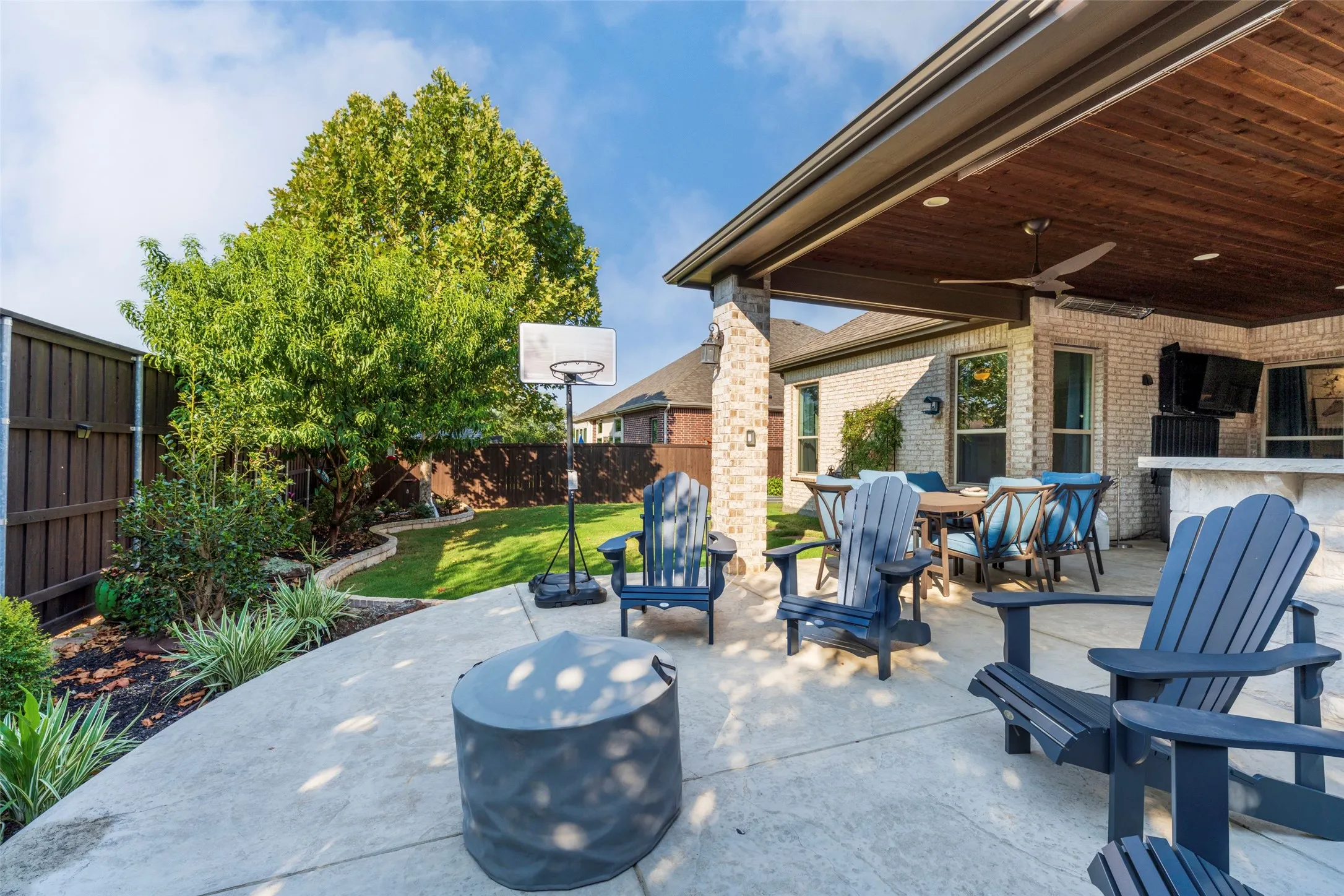 Landscaped back yard makes being outside enjoyable.