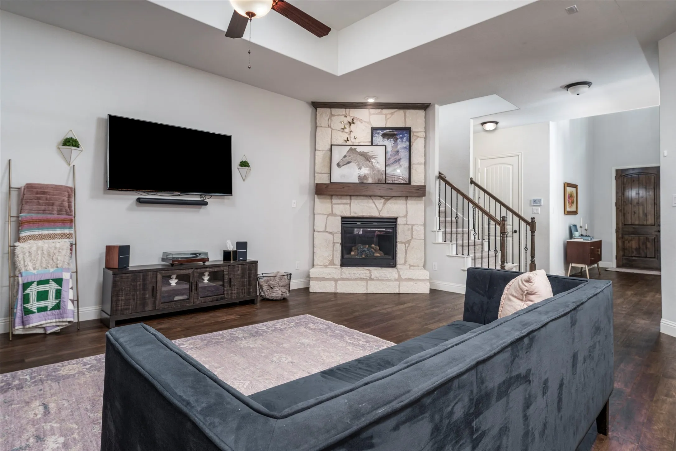 Gorgeous stone fireplace has gas logs for those cold winter evenings.