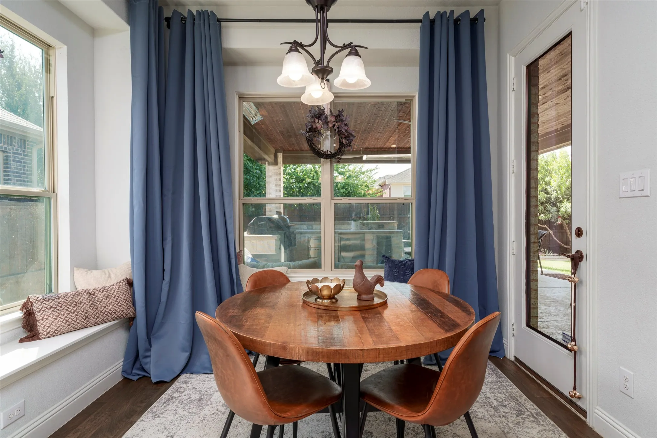 Breakfast nook offers lots of windows for looking outside.